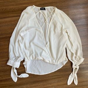 Parallel lines cross strap front shirt / blouse